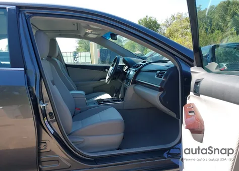 2012 Toyota Camry Xle z USA, uszkodzony, nr VIN 4T4BF1FK9CR241303